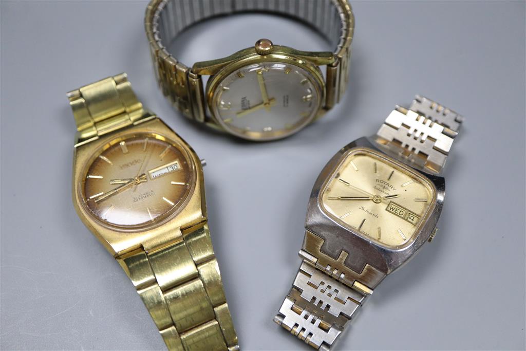 Five assorted wrist watches including Garrard & Rotary.